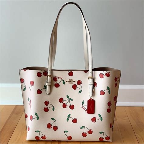 cherry coach purse tote.